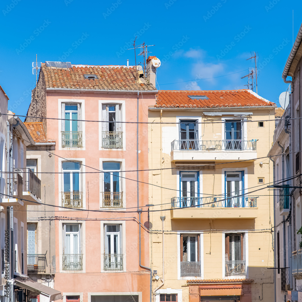 Fototapeta premium Béziers in France, colorful houses, typical facades in the old center 
