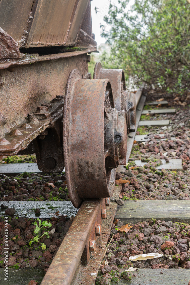 Wheels on disused ore cart.