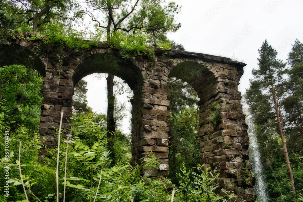 Old aqueduct in forest