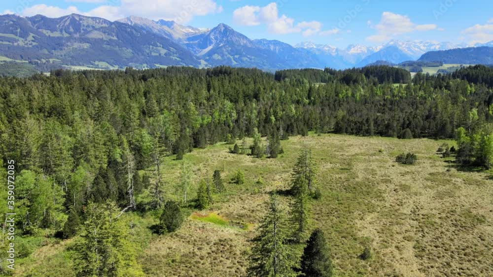 Typical landscape in Bavaria in the Allgau district of the German Alps - aerial view Typical landscape in Bavaria in the Allgau district of the German Alps - aerial view