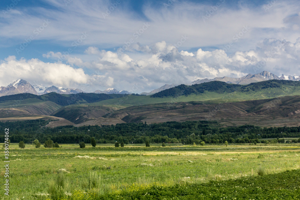 Plakat Mountains at the northern coast of Issyk Kul lake in Kyrgyzstan