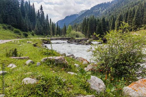 Bridge over Karakol river in Kyrgyzstan photo