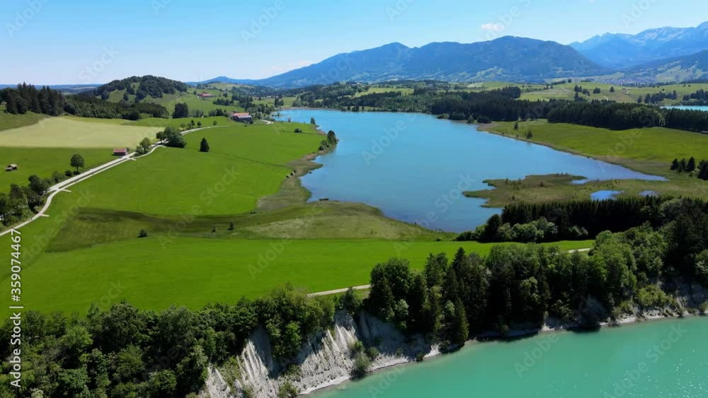 Aerial view over Lake Forggensee at the city of Fuessen in Bavaria Germany Aerial view over Lake Forggensee at the city of Fuessen in Bavaria Germany