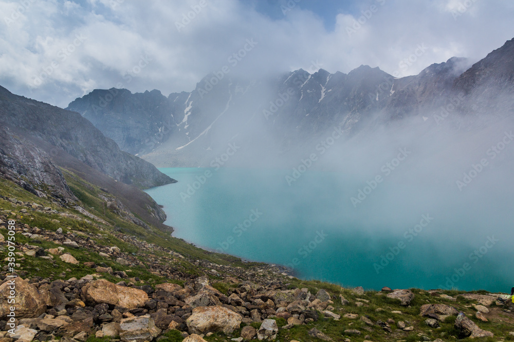 Mist at Ala Kul lake in Kyrgyzstan