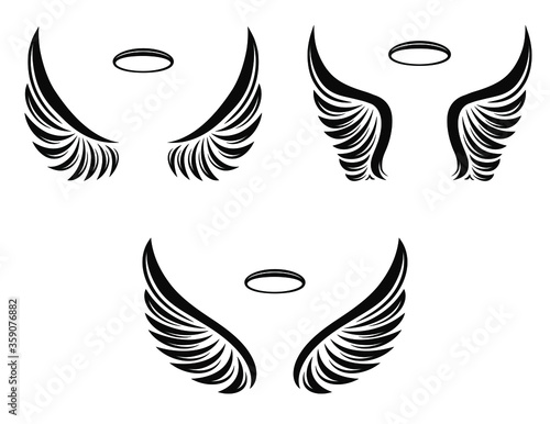 Set of three pairs of vector angel wings with nimbus