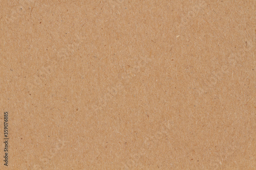 Brown textured cardstock paper closeup background photo