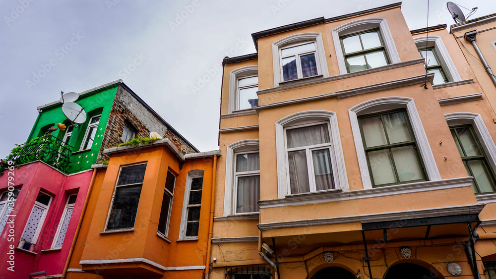 Obraz premium View of Balat houses / homes where is a historic district in Istanbul, old city in Marmara region, Turkey. Traditional Ottoman houses in Istanbul's European side. 