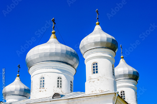 It's St. George's (Yuriev) Monastery, Russia's oldest monastery. It is part of the World Heritage Site named Historic Monuments of Novgorod and Surroundings. photo