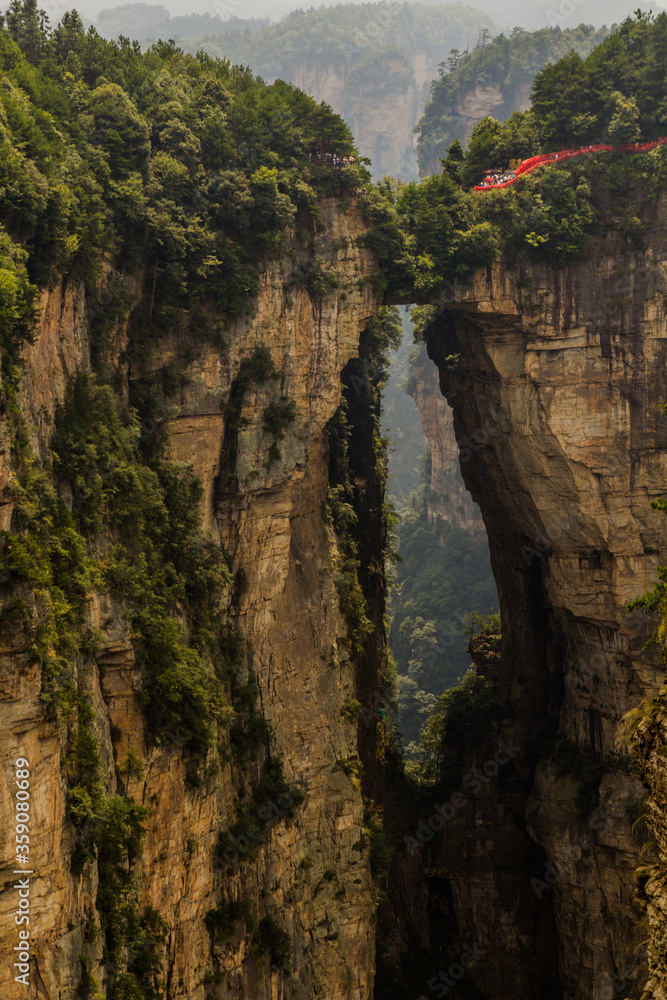 Natural rock bridge in Wulingyuan Scenic and Historic Interest Area in Zhangjiajie National Forest Park in Hunan province, China