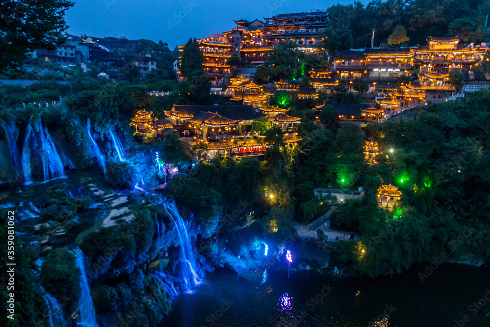 Evening view of Furong Zhen town and waterfall, Hunan province, China
