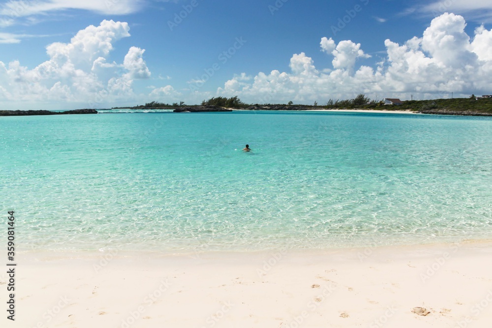 Beautiful blue ocean and white sand beach on clean blue sky background. Bahamas island. Beautiful  nature backgrounds.