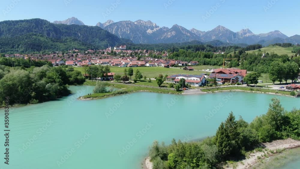 Aerial view over Lake Forggensee at the city of Fuessen in Bavaria Germany Aerial view over Lake Forggensee at the city of Fuessen in Bavaria Germany