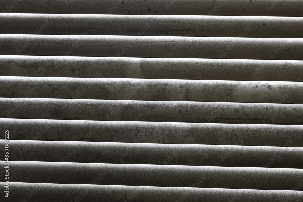 Extremely dirty window blinds in need of cleaning
Extremely dirty window blinds in need of cleaning