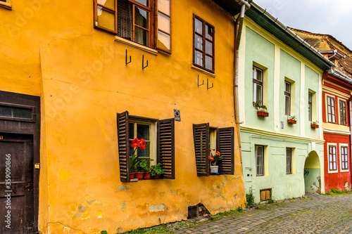 Fototapeta Naklejka Na Ścianę i Meble -  Colourful houses of the historic centre of Sighisoara, Romania. UNESCO World Heritage