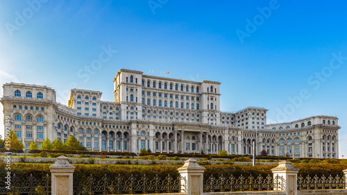 It's Palace of the Parliament (Palatul Parlamentului), Bucharest, Romania. Palace is the world's largest civilian building with an administrative function and heaviest building. photo