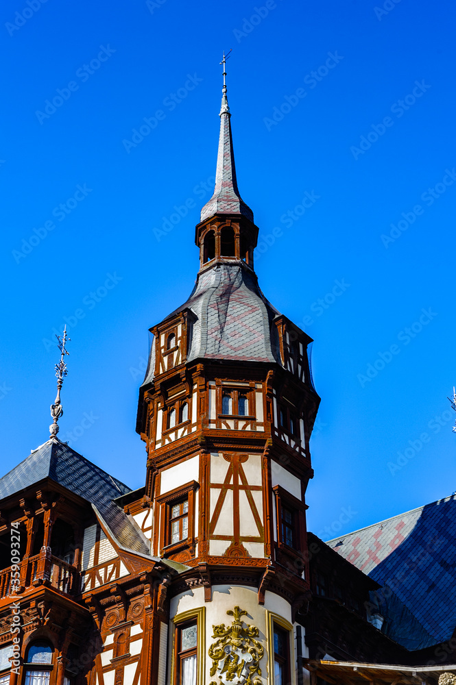 Obraz premium It's Tower of the Peles Castle, a Neo-Renaissance castle in the Carpathian Mountains of Romania