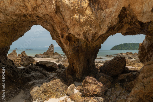 Scenic view at Ao khao kwai beach on Phayam island.  Called Hin Ta Lu  (Through rock) © take_a_shot