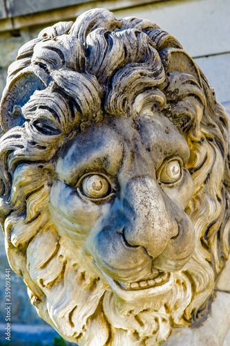 It's Lion Statue in the garden of the Peles Castle, Carpathian mountains, Romania