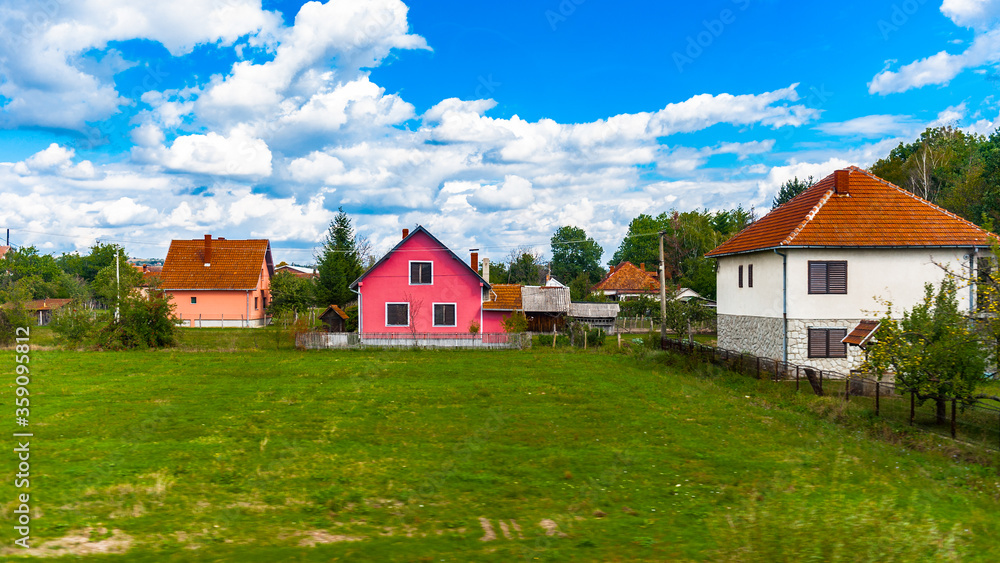 It's Red roof house in the field of Serbia It's Red roof house in the field of Serbia