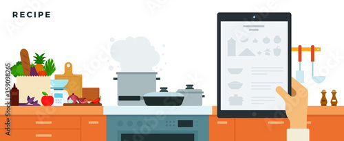 Kitchen with built-in furniture, appliances, utensils and a tablet with recipes vector illustration