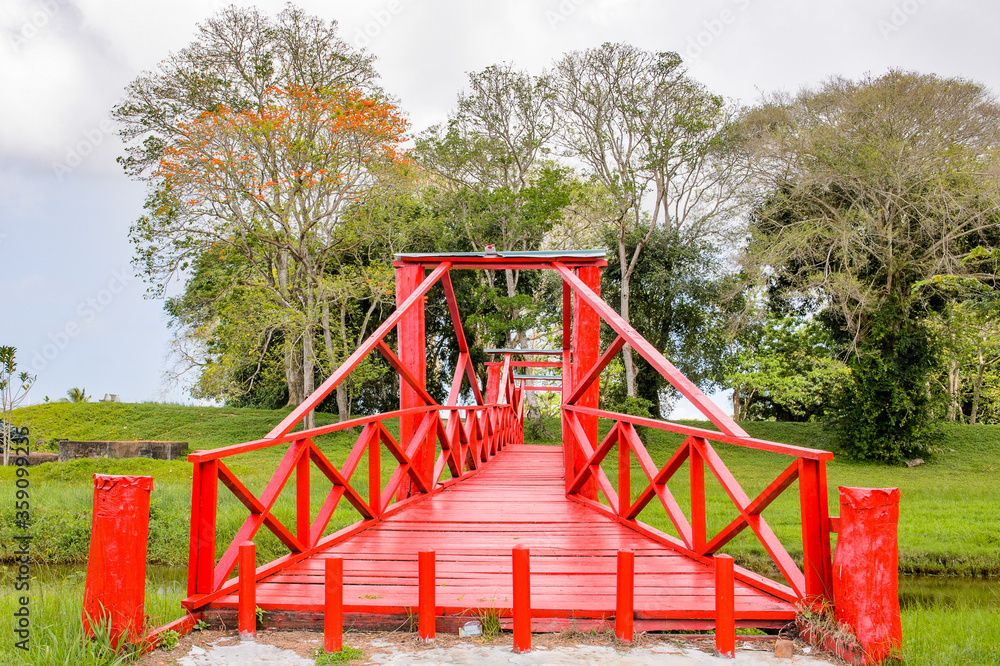 Red bridge in Suriname, South America Red bridge in Suriname, South America