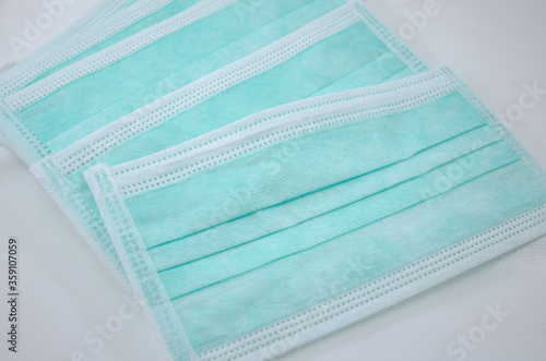 Hygienic mask green color on white background.