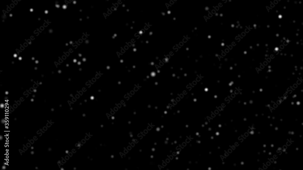 snow fall concept. Falling raindrops or snow against a black background snow fall concept. Falling raindrops or snow against a black background