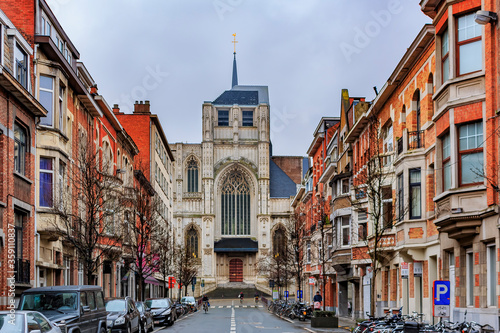 View on medieval St Peter's church and traditional brick houses in Leuven, Belgium