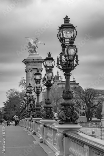 Photography Moody cityscape with Pont Alexandre III bridge and Seine river in Paris, France
