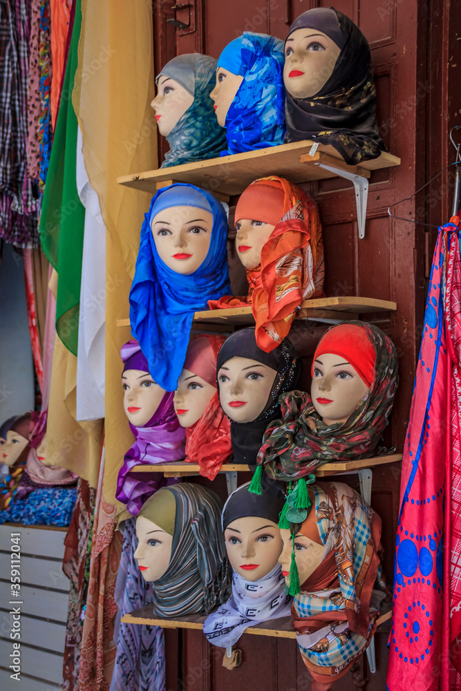 Women's head scarves on display at the market in Fes Morocco Women's head scarves on display at the market in Fes Morocco
