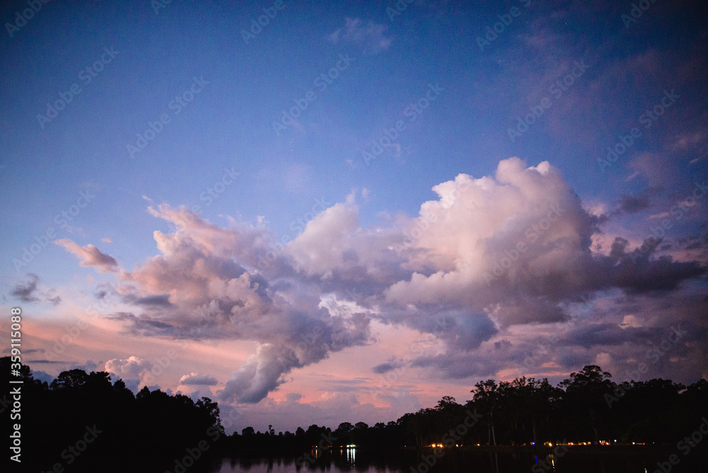 Fototapeta premium beautiful colorful magic hour twilight sky and clouds