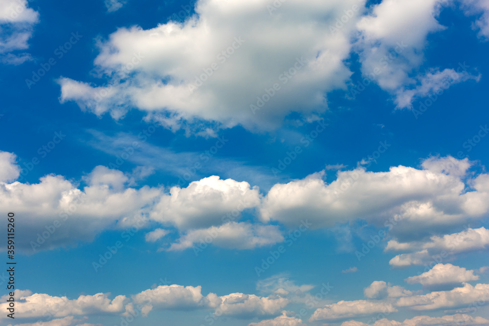 Naklejka premium Gray and white clouds on blue sky background.