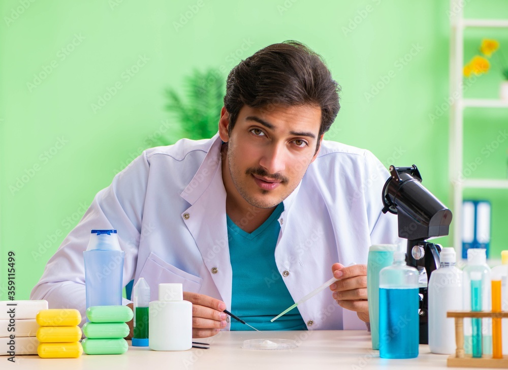 Chemist testing soap in the lab Chemist testing soap in the lab