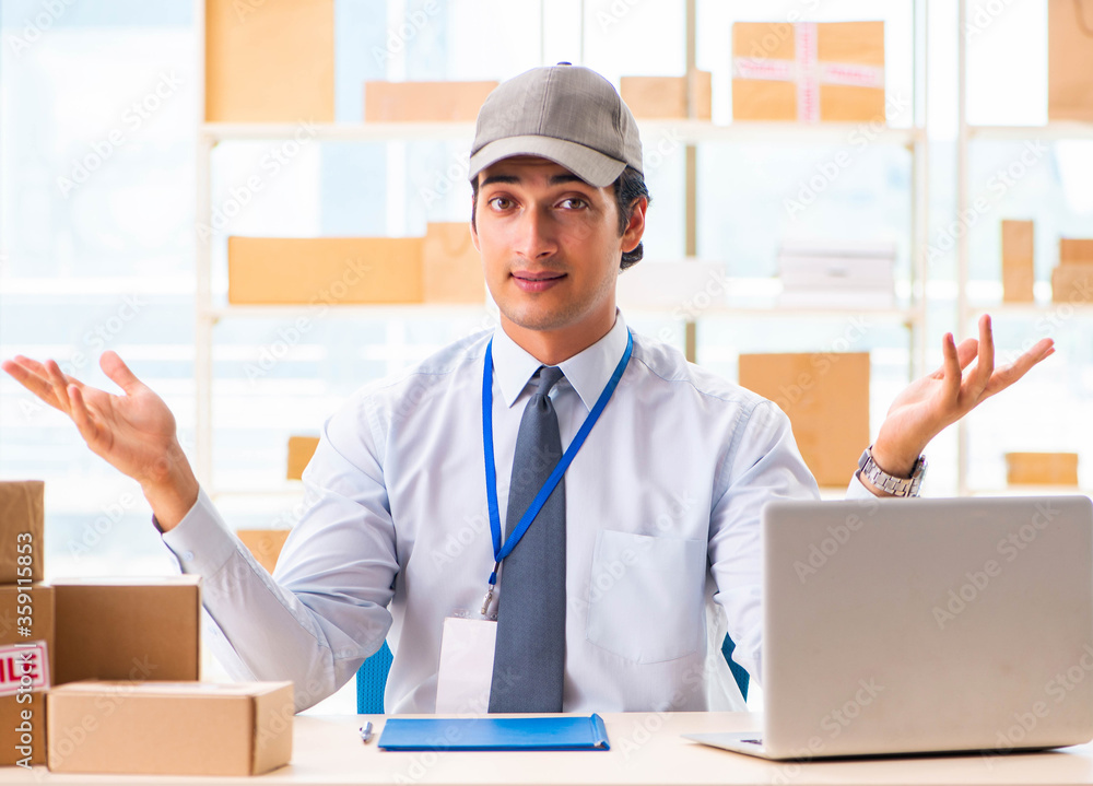 Male employee working in box delivery relocation service Male employee working in box delivery relocation service