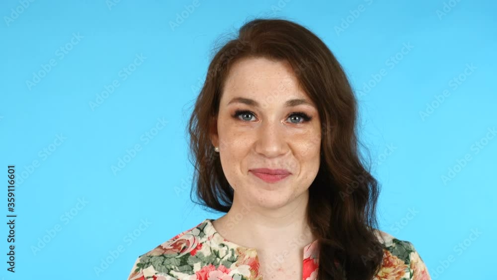 Beautiful european woman looking at camera. Freckles woman portrait. Beautiful european woman looking at camera. Freckles woman portrait.