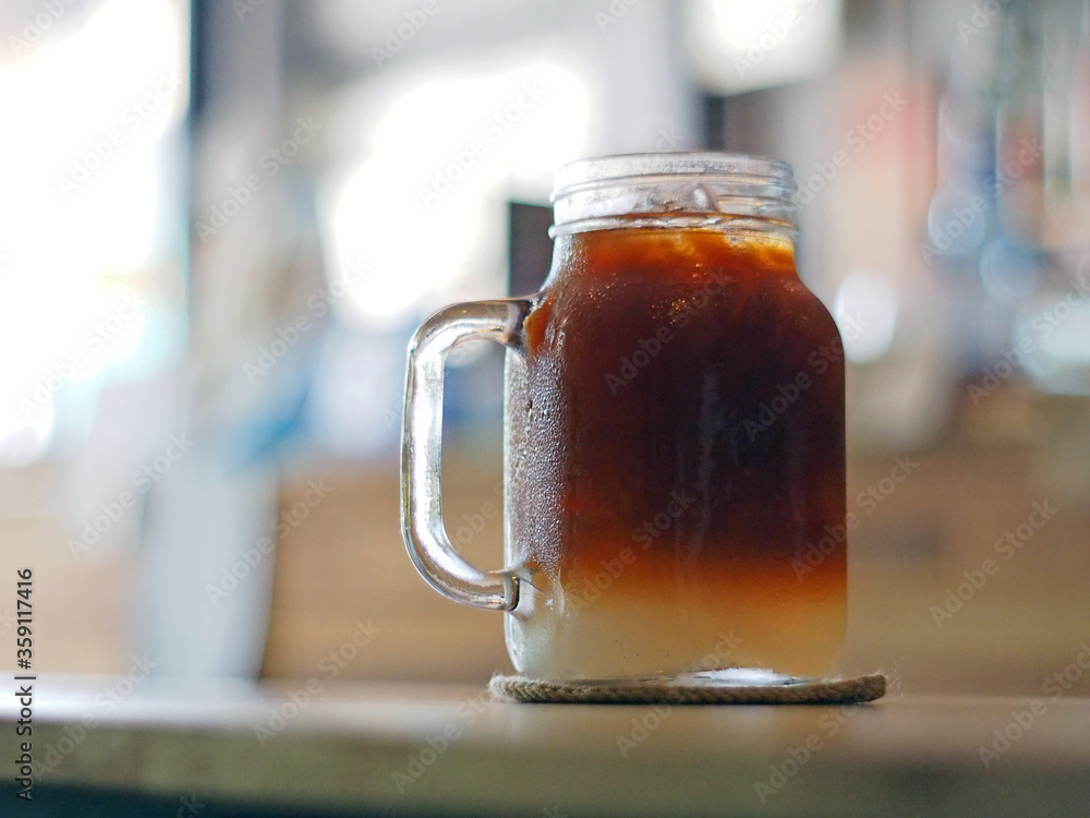 Ice coffee, americano coffee with lychee in cafe. Ice coffee, americano coffee with lychee in cafe.