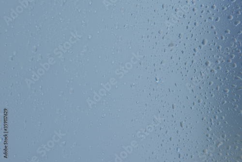 Water drops over blank background