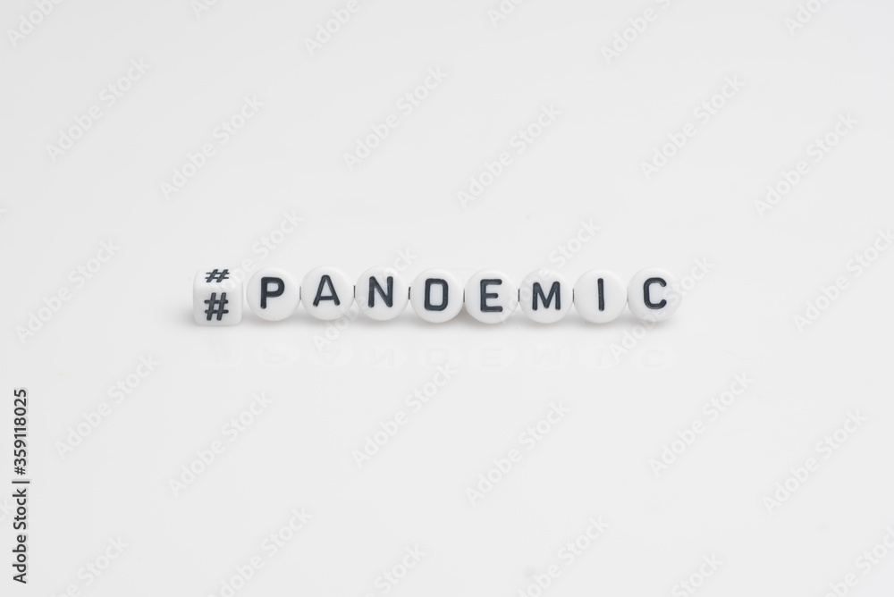 The word pandemic in small alphabetical beads, isolated over white The word pandemic in small alphabetical beads, isolated over white