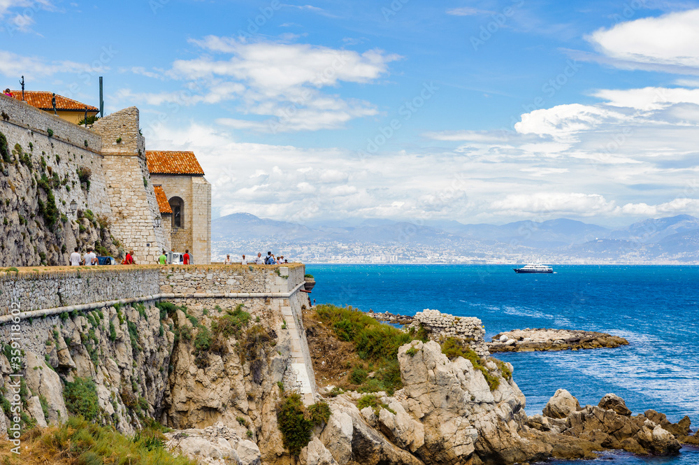 It's Old town of Antibes on the rock of the Mediterranean, Cote d'Azur, France. Antibes was founded as a 5th-century BC Greek colony and was called Antipolis