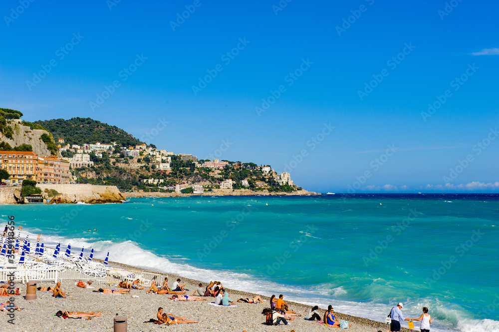 It's Beach of the Mediterranean sea, Cote d Azur, Nice, France. Nice is the capital of the Alpes Maritimes departement