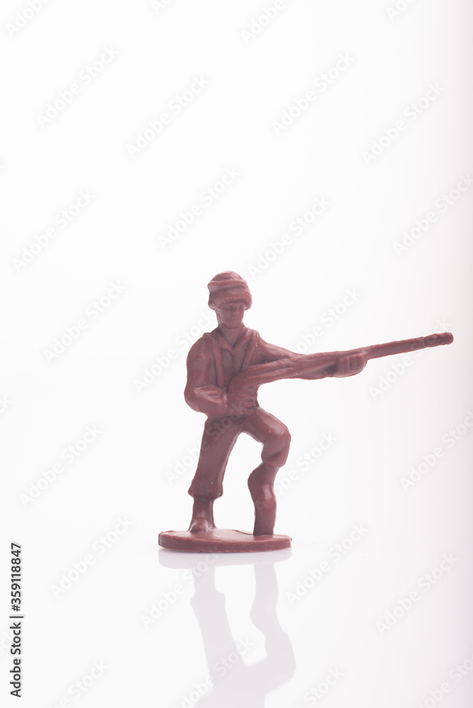 A toy soldier isolated over white background A toy soldier isolated over white background