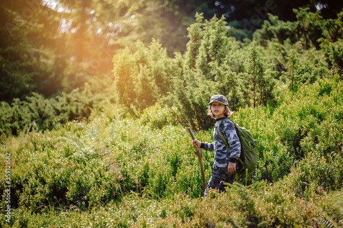 Portrait of teenager boy with equipment hiking in summer Carpathians © Denys Kurbatov