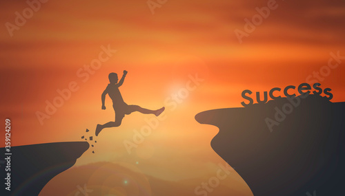 man jump cliff at sunrise