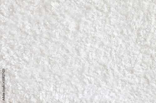 White fluffy carpet texture. Soft luxury Shag Rug. Short shag carpet surface. Domextic high-density white rug.
