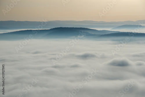Morning mist on mountain in autumn
