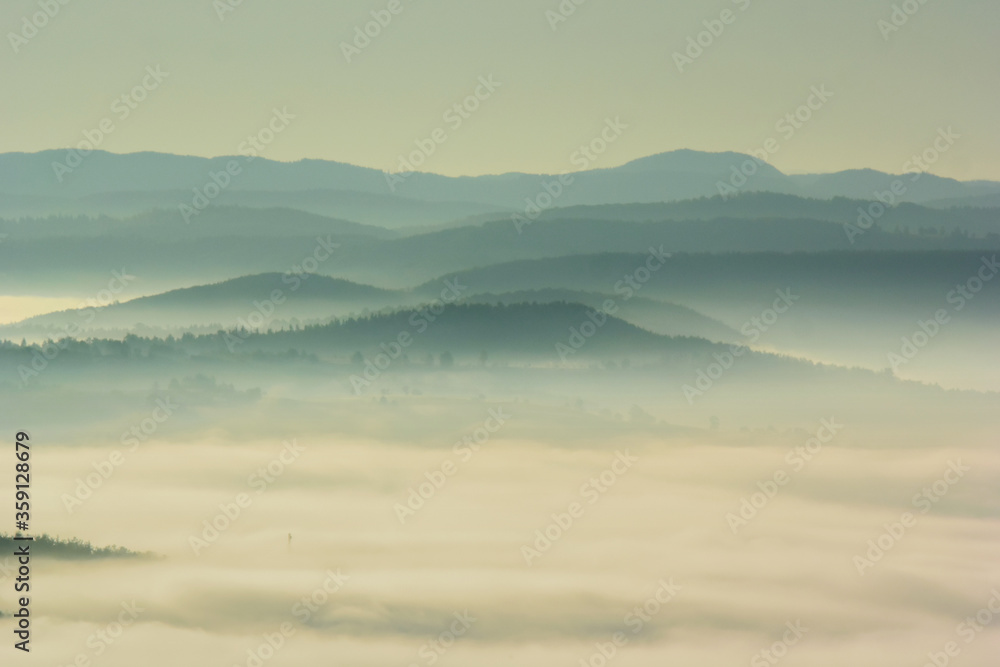 Morning mist on mountain in autumn