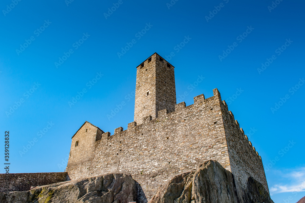 It's The Torre Bianca (White tower) of the Castelgrande in Bellinzona, Switzerland. UNESCO WOrld Heritage sign
