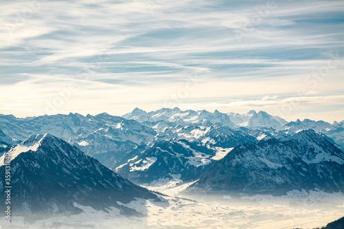 View of mountains range covered by snow in winter in Switzerland © Kapi