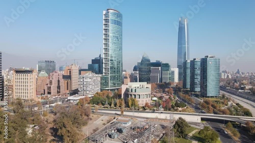 Aerial orbit of financial district buildings on a sunny day in Santiago, Chile photo