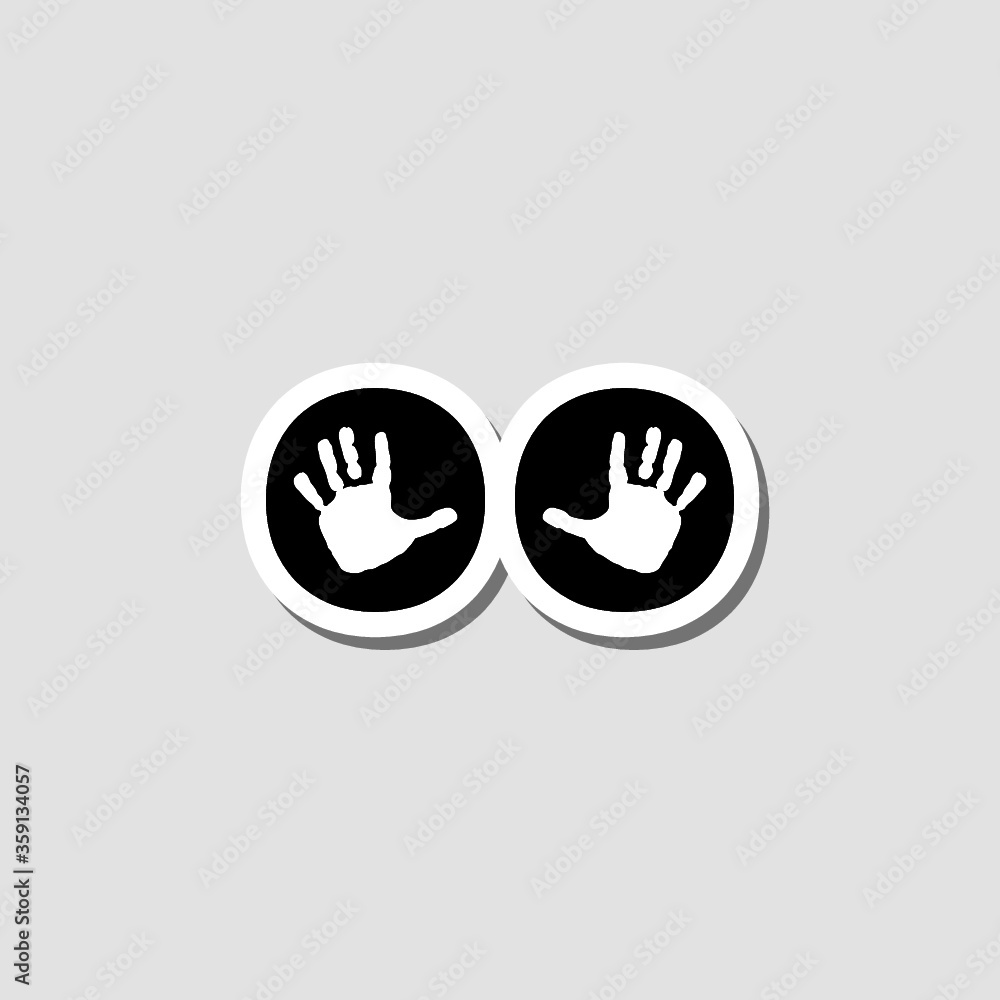 Hand prints sticker icon isolated on gray background Hand prints sticker icon isolated on gray background